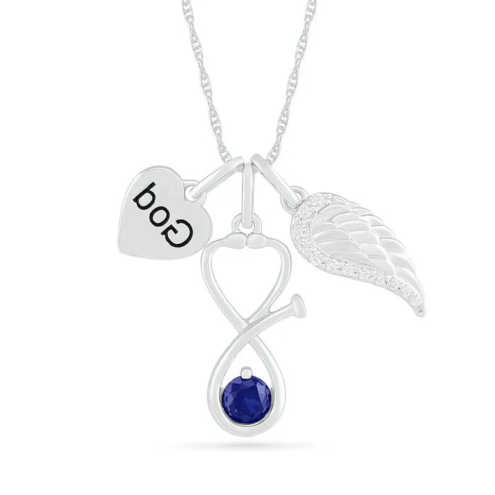 Necklaces Goldia 40mm LabCreated Blue and White Sapphire Stethoscope Wing and God Heart Disc Charm Pendant in Sterling Silver Necklaces Goldia 40mm LabCreated Blue and White Sapphire Stethoscope Wing and God Heart Disc Charm Pendant in Sterling Silver