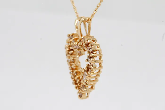 FULLERS PURCHASE FROM PUBLIC Necklaces Estate 10KY 50 Cttw Diamond Heart Pendant FULLERS PURCHASE FROM PUBLIC Necklaces Estate 10KY 50 Cttw Diamond Heart Pendant