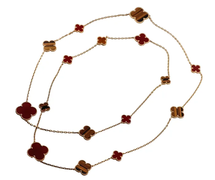 Van Cleef Arpels Magic Alhambra Carnelian Tigers Eye 16 Motif Necklace Van Cleef Arpels Necklaces