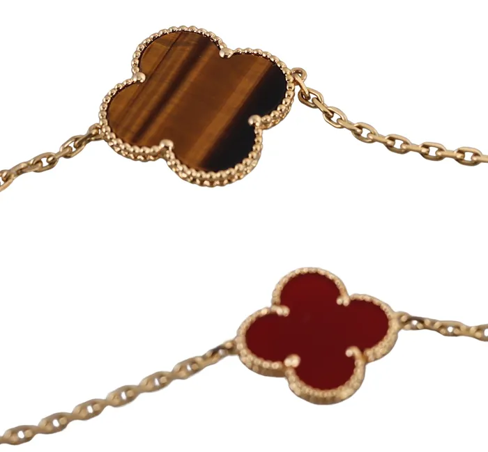 Van Cleef Arpels Magic Alhambra Carnelian Tigers Eye 16 Motif Necklace Van Cleef Arpels Necklaces