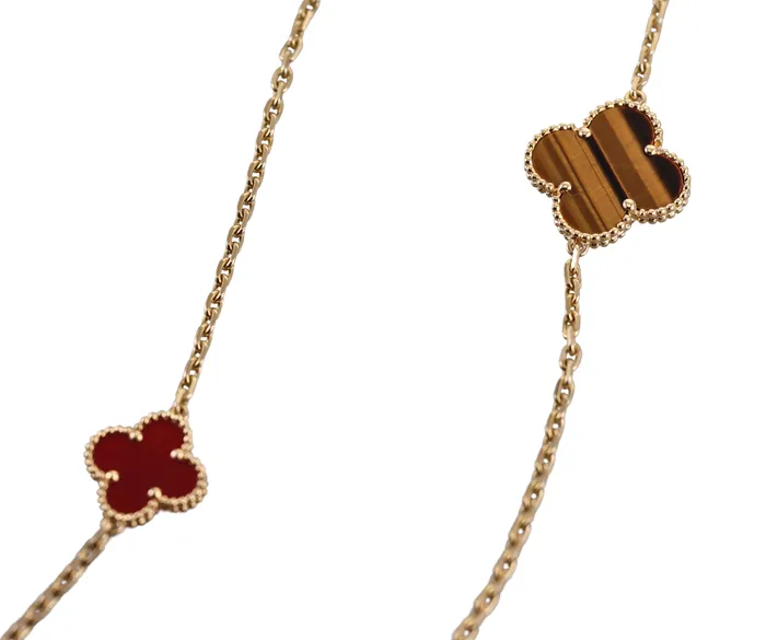 Van Cleef Arpels Magic Alhambra Carnelian Tigers Eye 16 Motif Necklace Van Cleef Arpels Necklaces