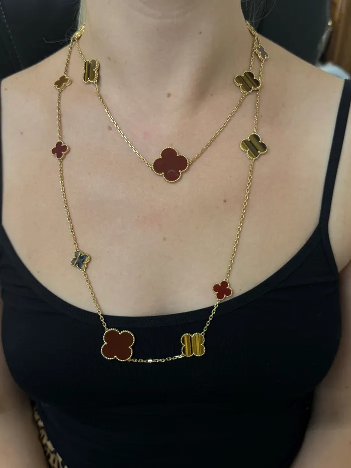 Van Cleef Arpels Magic Alhambra Carnelian Tigers Eye 16 Motif Necklace Van Cleef Arpels Necklaces